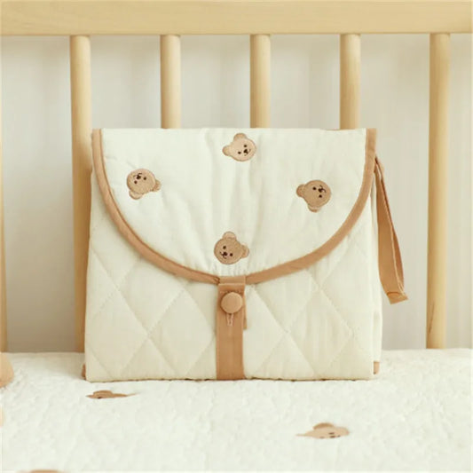 Tapis à langer pliable | Tapinou™