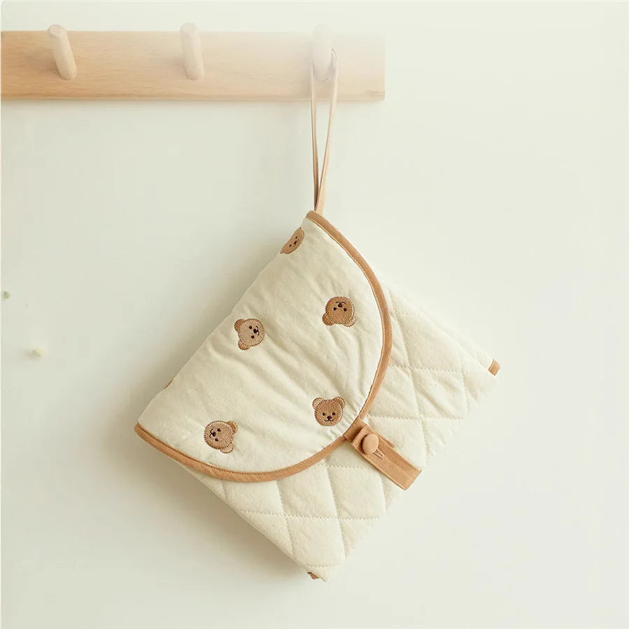 Tapis à langer pliable | Tapinou™