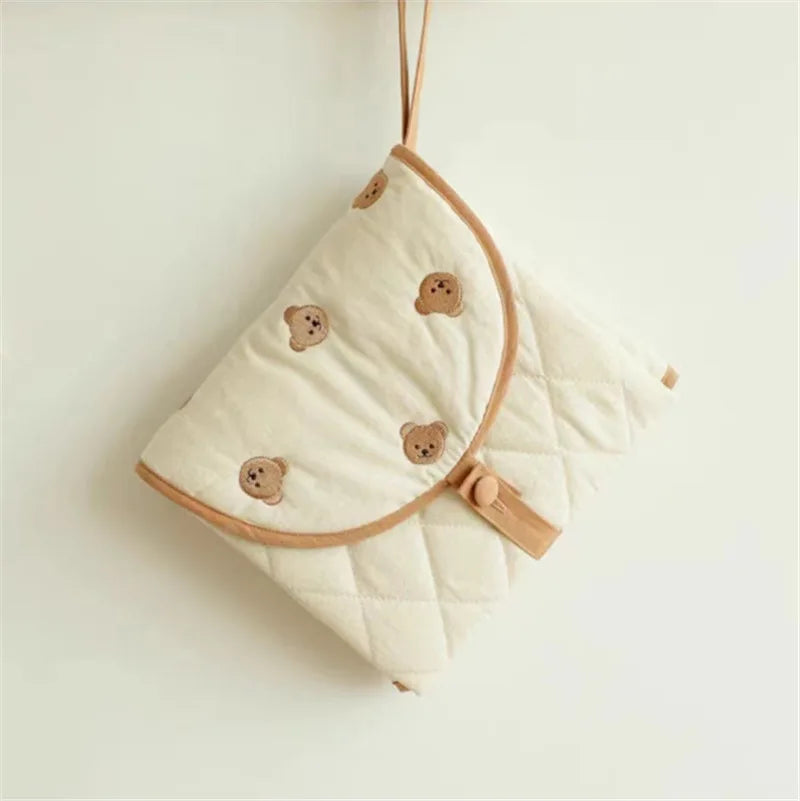 Tapis à langer pliable | Tapinou™