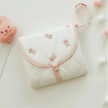 Tapis à langer pliable | Tapinou™