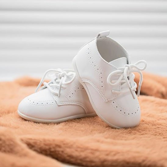 Chaussure bébé fille blanche premiers pas avec lacets