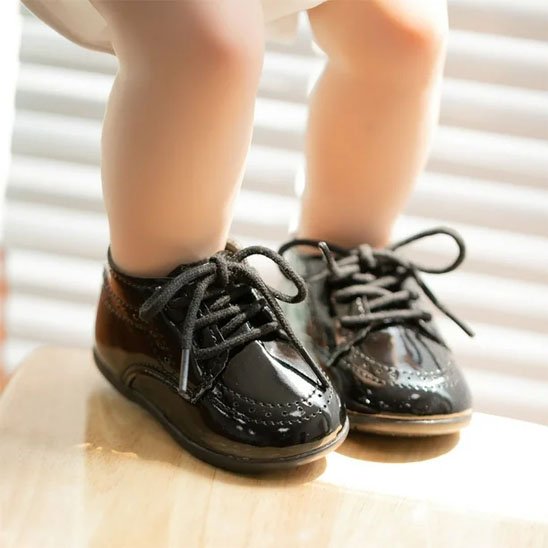 Chaussure bébé noire souple avec semelle antidérapante