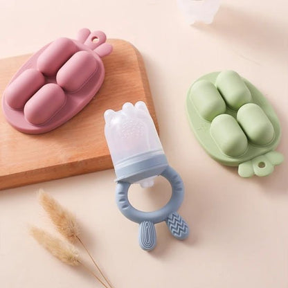 Grignoteuse bébé en silicone alimentaire disponible en plusieurs coloris pour la diversification