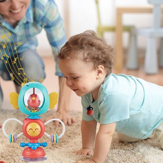 Hochet pour bébé interactif utilisé au sol pour développer la motricité fine