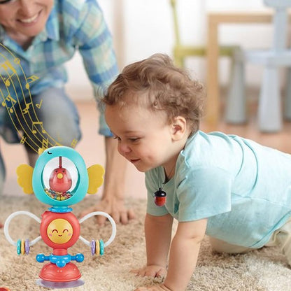 Hochet pour bébé interactif utilisé au sol pour développer la motricité fine