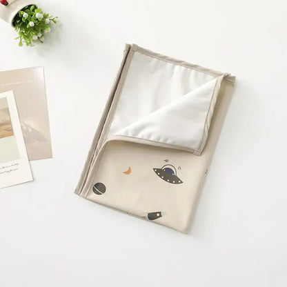 Tapis à langer nomade | Elano™